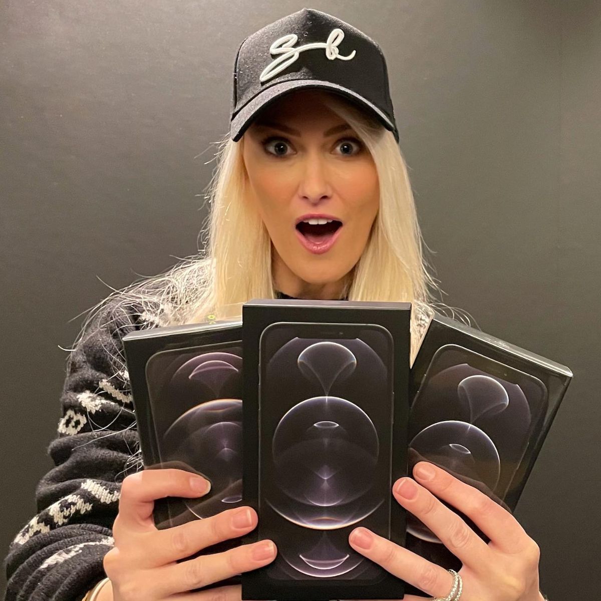  Alexandra Mary Hirschi holding a three iPhone 12 giveaway contest for her fans and followers